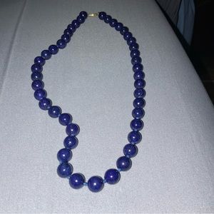 BLUE LAPIS NECKLACE an 14K yellow gold clasp.  18 inches.
